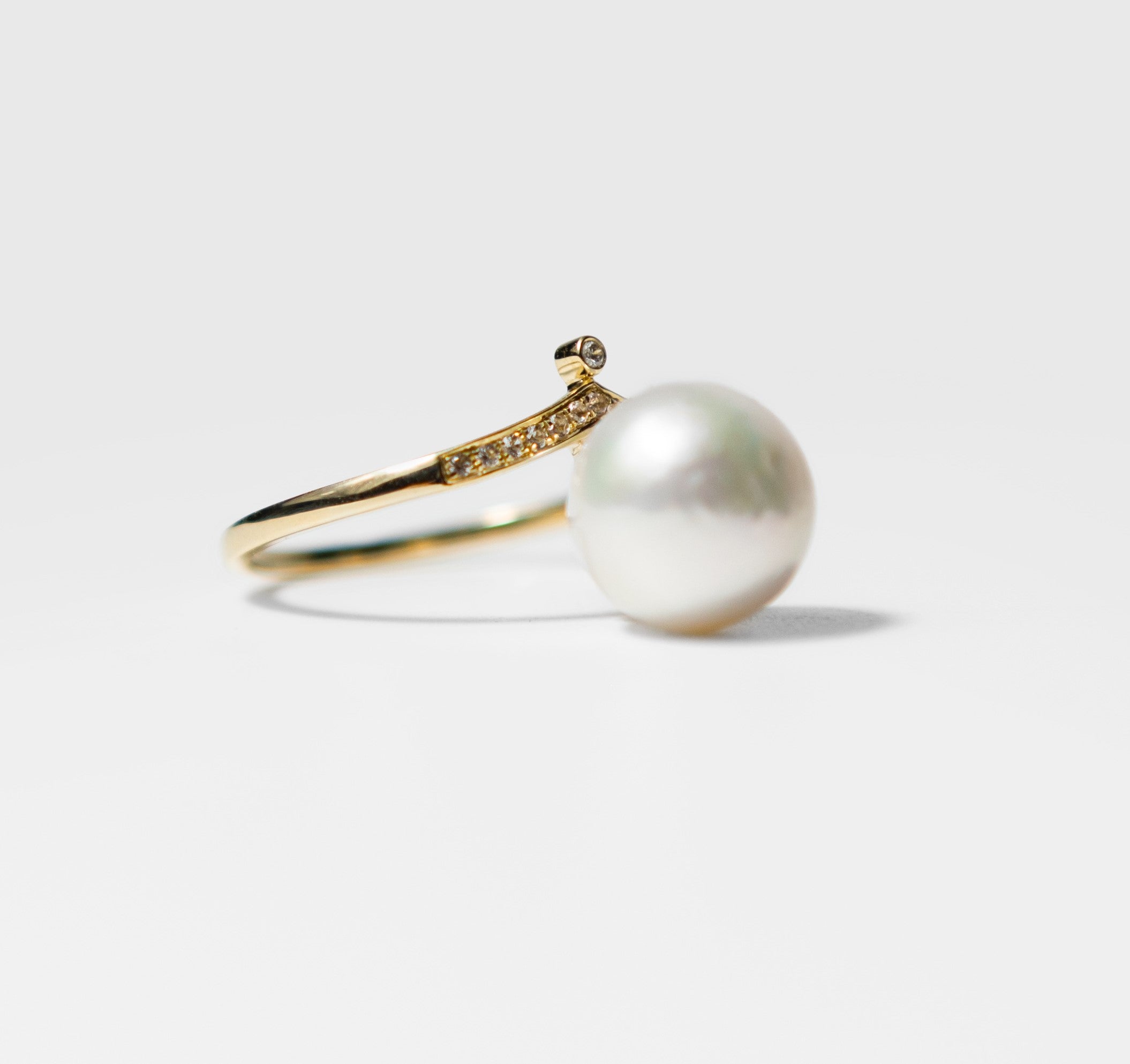 White Pearl and Topaz/Diamond Ring